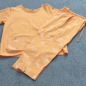 Vacation casual 2 piece set with beach motif.